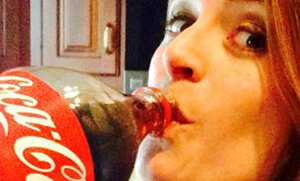 chey drinks coke-blog