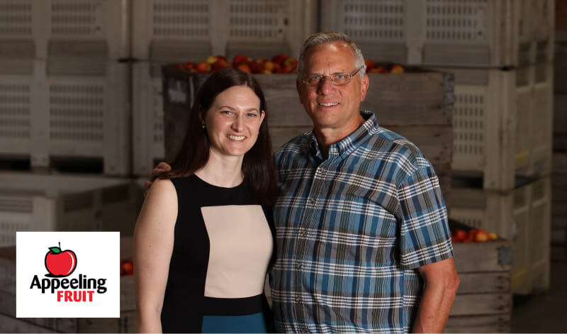 appeeling fruit owner and daughter