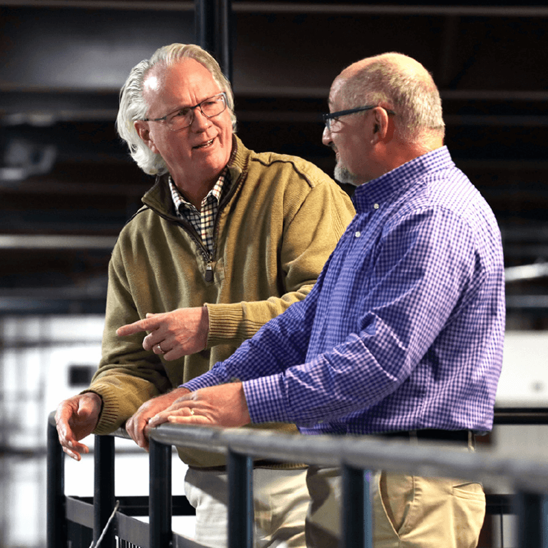 Tom Garrity talking with Hovertech owner